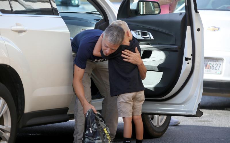 Students across the Elbert County School District returned to school Monday, Aug. 2. Among them were students at Elbert County Primary School, who received hugs and kisses from parents before beginning the school day. See more photos of the school’s first day of school on page 6. (Photos by Scoggins)