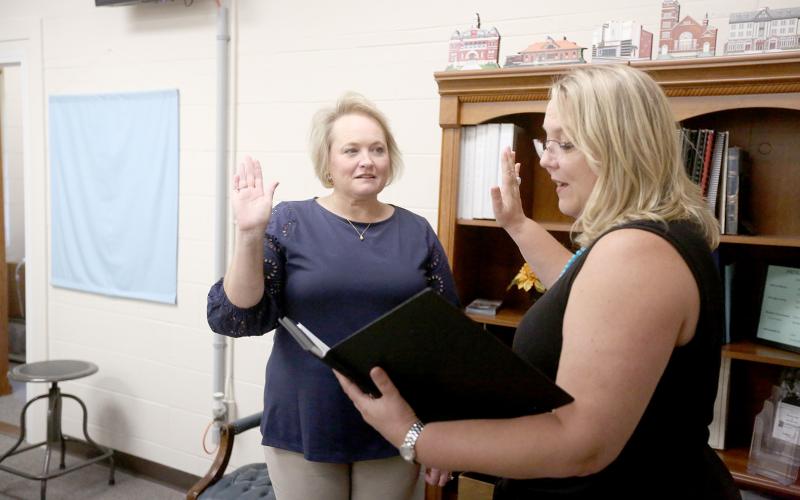 Heather Nestor (left), the newest District 3 representative on the Elbert County Board of Education, was sworn in by Probate Judge Stephanie Hewell  (right) Friday, Aug. 5. (Photo by Scoggins)