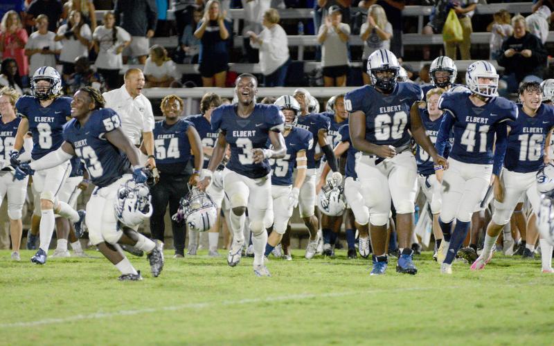 The Blue Devils celebrate their 31-28 win over Hart County after the game Friday, Aug. 19. (Photo by Drew Dotson, The Hartwell Sun)