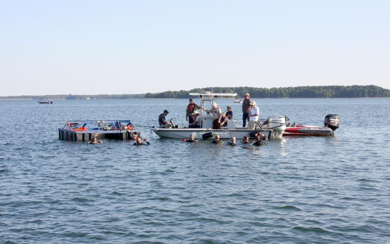 Members of the Elbert County Water Response and Rescue Team helped recover the body of a pilot of a double-engine plane that crashed in Lake Hartwell Sept. 10. The pilot was identified as Todd Jeffrey Carrell, 55, of North Port Florida. (Photo courtesy of Elbert County Emergency Services)
