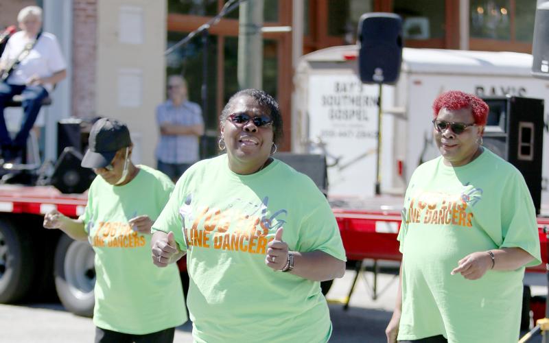 The annual Bowman Fall Festival included a good time filled with dancing on the downtown square Saturday, Sept. 24. While music played, the 706’ers line dancers boogied to the music along with Bowman Librarian Vivian Barnes. (Photos by Scoggins)