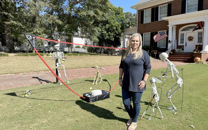 Jennifer Mearkle started “The Cadaver Chronicles” as a way to have fun throughout the month of October. A different skeletal scene can be found in front of her home every day throughout the month. (Photo by Scoggins)