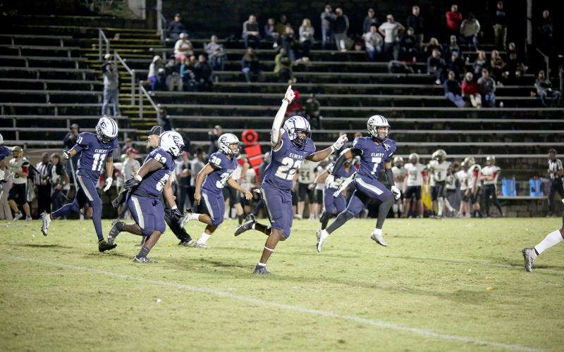 The Elbert County Blue Devils are headed to the second round of the GHSA state playoffs after a 31-7 win over Pepperell High School in the first round Friday, Nov. 11. (L-R) Christian Harris (No 11.), D.J. Raiford (No. 53), Miguel Rodriguez (No. 30), Malik Hill (No. 22) and L.J. Clark (No. 7) react to a play during the Devils’ win over the Dragons. (Photo by Scoggins)