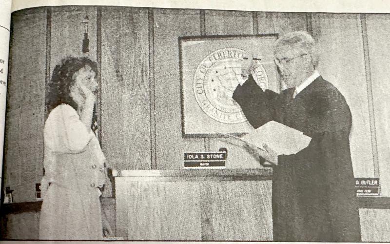 Chief Magistrate Judge Lanie Simmons (left) was sworn in by former Superior Court Judge John H. Bailey Jr. after being appointed to the position in July 1996. Simmons finished the remainder of former Chief Magistrate Marie Dewberry’s term and has been elected to six consecutive four-year terms. (Photo from the July 17, 1996 edition of The Elberton Star)