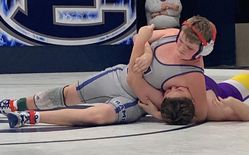 Mat Ram Landon Bowman pins an opponent from Athens Christian in the Inferno Nov. 29.