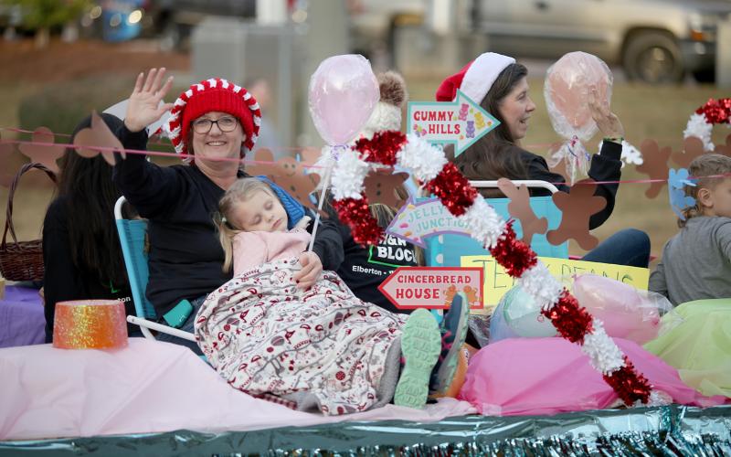 The Elbert County Chamber of Commerce held its annual Christmas parade Sunday, Dec. 4. Parade goers enjoyed festive “Candy Cane Lane” themed floats like the above from H&amp;R Block, cars and performances from Elbert County’s Blue Devil Marching Band, cheerleaders and local dance and cheer organizations. See more photos on page 8. (Photo by Scoggins)