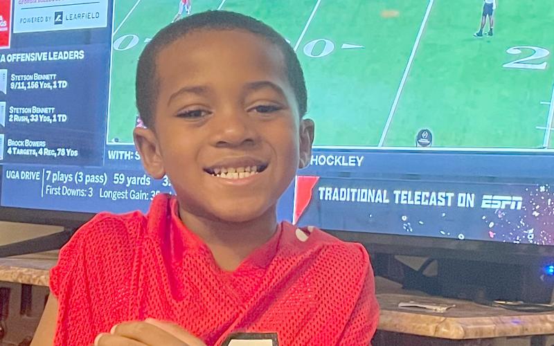 Elbert County’s Kaanan Rucker watched the game on TV.