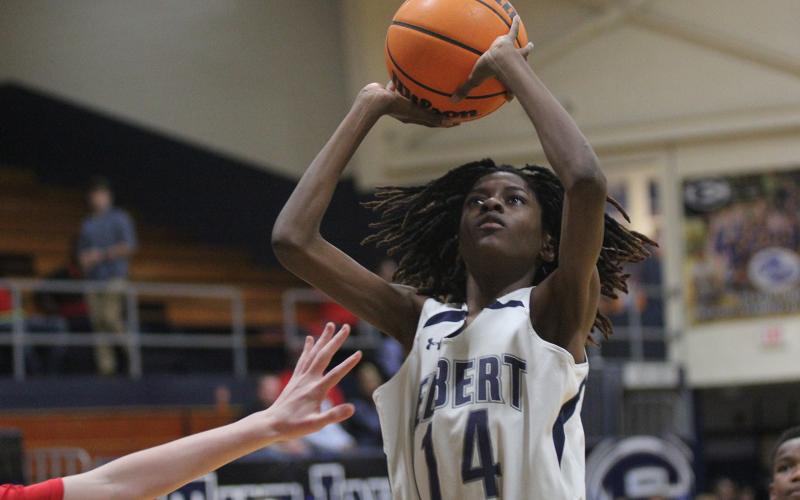 Seventh grade Ram Jaylin Morrison looks to the basket during the Rams’ game against Stephens County Middle School in the Inferno Jan. 5. (Photo by Wells)