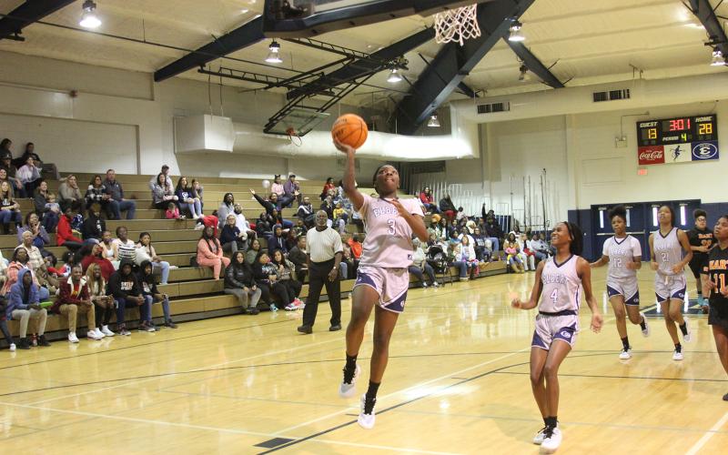 Alexis Huff (No. 4) watches as Aaliyah Allen scores against Hart Jan. 7 in the ECCHS gym. (Photo by Wells)