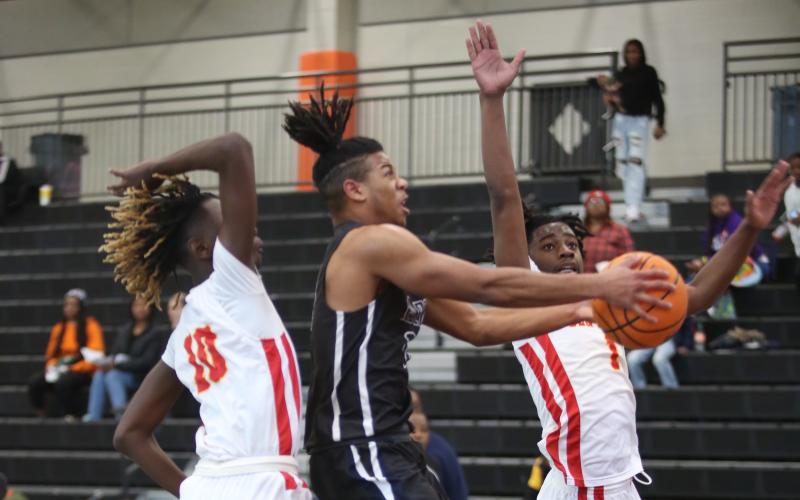 Senior Trustin Allen was the leading scorer for the Devils during the McDonalds Shootout in Hartwell Dec. 27 through Dec. 29. (Photo by Scoggins)