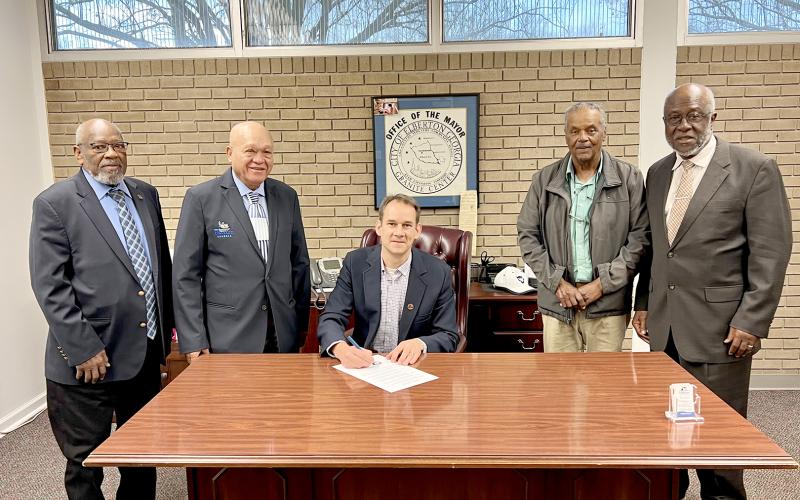 Pictured during the proclamation signing include (L-R) Hunt, Burton, Graves, John Hubbard and John Clark.
