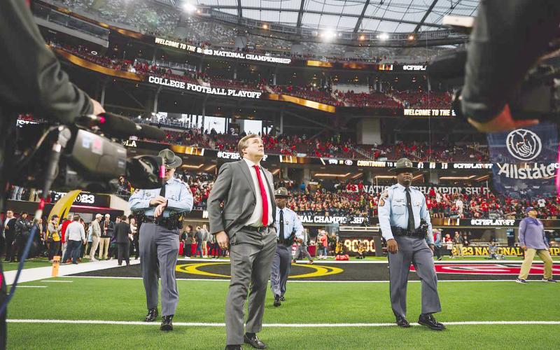 Elbert County native O’Neal Saddler (above left with University of Georgia Football Coach Kirby Smart) was on the sidelines of UGA’s most recent National Championship win Jan. 9 in Los Angeles. (Photo provided by Saddler)