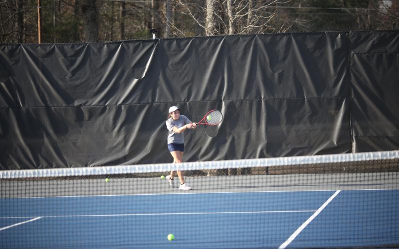 Devils and Lady Devils Emily Poon, Justin Brown, Broughton Smith and Katie Nguyen kicked off the 2023 tennis season Feb. 7 against Tallulah Falls at McWilliams Park. (Photos by Wells)