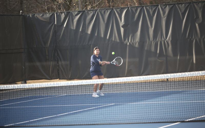 Devils and Lady Devils Emily Poon, Justin Brown, Broughton Smith and Katie Nguyen kicked off the 2023 tennis season Feb. 7 against Tallulah Falls at McWilliams Park. (Photos by Wells)