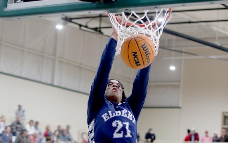 Senior Trustin Allen dunks the ball during the Devils’ loss to Tallulah Falls Feb. 17 during the Region 8A-D1 tournament. Allen scored his 1,000th point during the game that left the Devils finishing fourth in the region. (Photo by Scoggins)