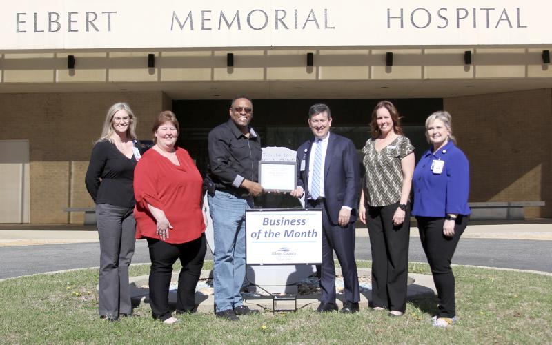 Elbert Memorial Hospital was named the Business of the Month for March by the Elbert County Chamber of Commerce. Pictured with a sign to be displayed in front of the hospital are (L-R) Director of Marketing and Patient Experience Rachel McCall, Chief Operating Officer Tammy Harlow, Chamber Chair Kam McClary, Chief Executive Officer Tyler Taylor, Chamber President Rebecca Holliday and Chief Nursing Officer Tonya Chitwood. (Photo by Wells)