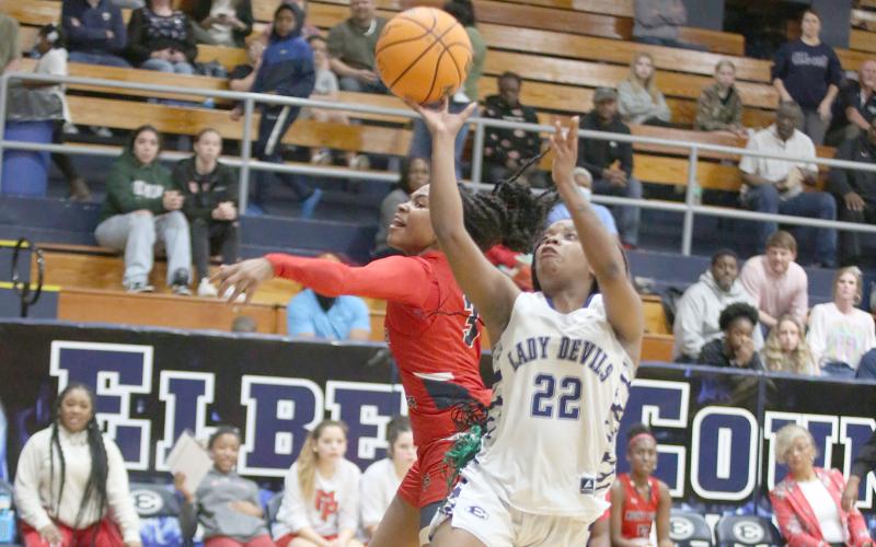 senior Jameria Allen jumps to score during the game. (Photo by Scoggins)