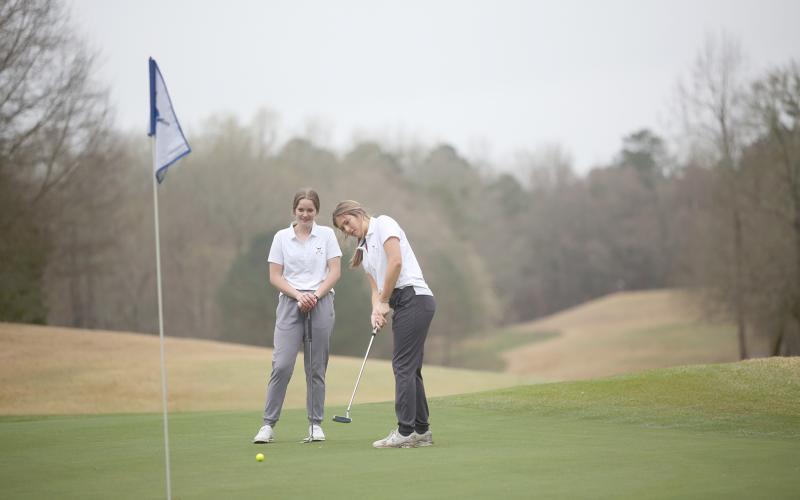 Lady Devils (L-R) Emalise Andrews and Ellie Wheeler finished in ninth place during the Blue Devil Shootout Feb. 25. (Photo by Wells)