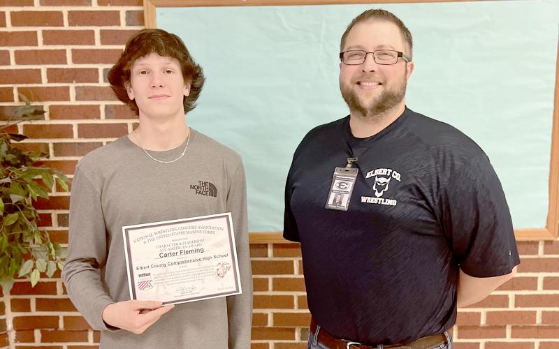 Fleming (above left) is pictured with Mat Devils Head Coach Shane Anderson.