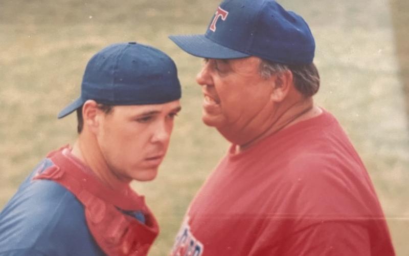 Lance Ingram (left) and his father Bill “Chief “ Ingram have a chat during a Thomasville Travelers game while Lance was in high school. Lance and Chief have both made a career of coaching high school baseball and Lance’s two son’s Landen and Brayden continue the baseball tradition as they were both members of Elbert’s Diamond Devil squad this season.