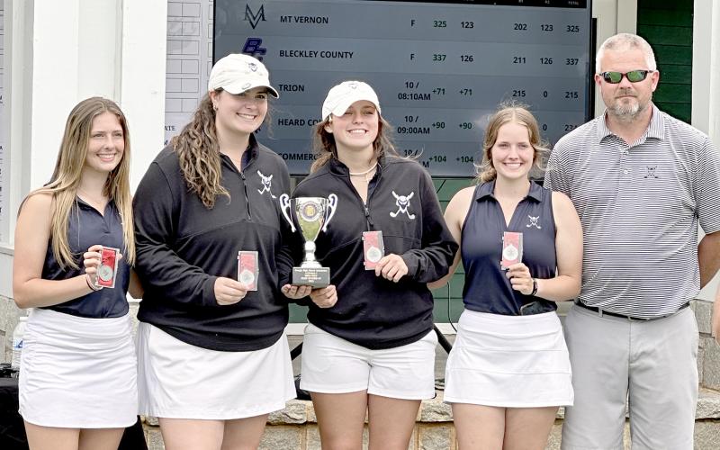 Elbert County’s Lady Devils, consisting of (L-R) Ellie Wheeler, Ava Dye, Abby Bryant and Emalise Andrews, pictured with Head Coach Larry Kesler, finished second in the state in the GHSA State Championship at Arrowhead Pointe Golf Course May 23.