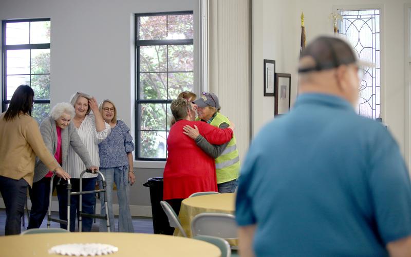 Pictured is Elrod hugging Mayor Roberta Rice. (Photo by Wells)
