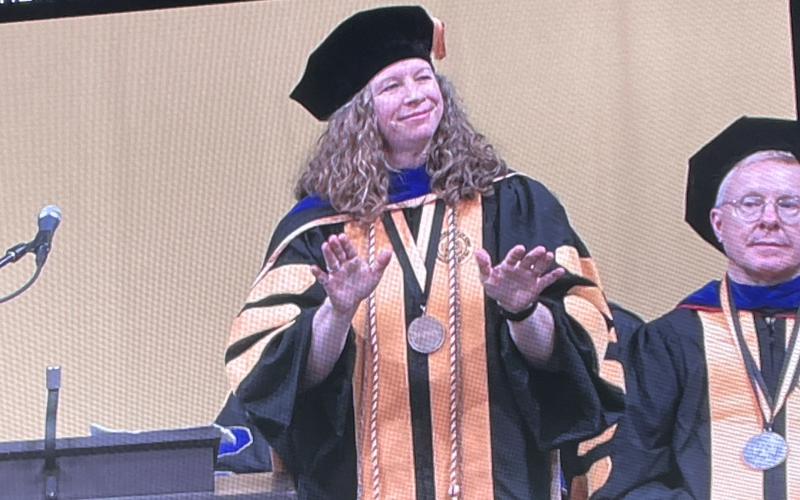 Elbert County native Carly Armour (right) was selected out of 400 doctoral graduates to give remarks during the Graduate Doctoral Commencement Ceremony at the University of Iowa May 12. Armour was also honored just days before her graduation with the University of Iowa Center for Inclusive Academic Excellence Dean’s Achievement Award by the Graduate College and the College of Education. Pictured during the commencement ceremonies are (left, L-R) Nancy Armour, Carly Armour and Fred Armour.