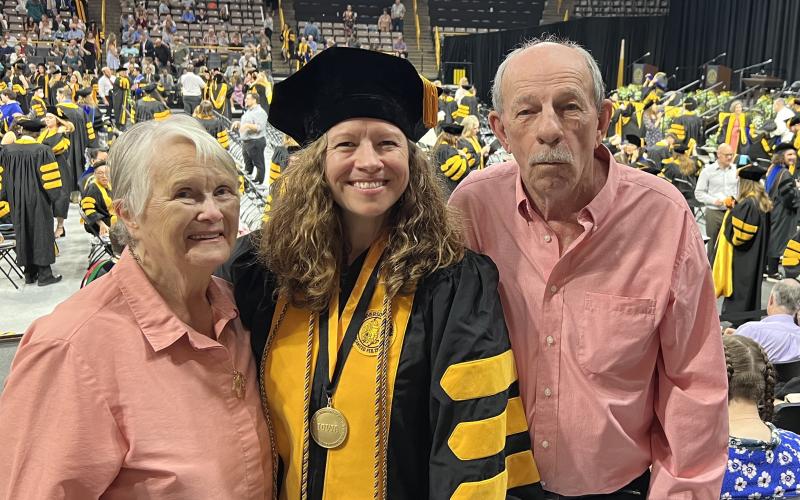 Elbert County native Carly Armour (right) was selected out of 400 doctoral graduates to give remarks during the Graduate Doctoral Commencement Ceremony at the University of Iowa May 12. Armour was also honored just days before her graduation with the University of Iowa Center for Inclusive Academic Excellence Dean’s Achievement Award by the Graduate College and the College of Education. Pictured during the commencement ceremonies are (left, L-R) Nancy Armour, Carly Armour and Fred Armour.