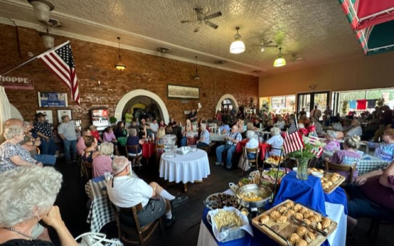 A large crowd gathered at the Elbert County Republican Party meeting June 8 at McIntosh Coffee Shoppe to listen to Elbert County Chief Appraiser Doug Kirkpatrick explain the property revaluation process. The Republican Party will host another meeting Thursday, June 15 at 6:30 p.m. in the Elbert County Government Complex cafeteria. (Photo by Scoggins)