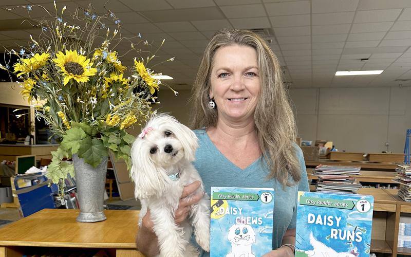 Elbert County Primary School media specialist and local author Michelle Scarborough has published her third book in her “Crazy Daisy” series inspired by her pet Maltese, Daisy. (Photo by Hall)