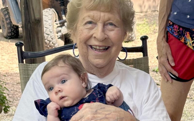 Ted Ethridge held the youngest attendee, five month old Laremie Kate York.