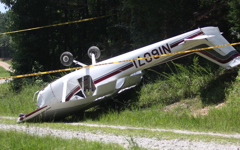 A plane flown by an Abbeville, South Carolina resident crashed off the end of the Elbert County Airport after a mechanical issue prevented the pilot from clearing the treeline. Airport Manager Randy Haralson said there were no injuries, but the plane was totaled. (Photo by Wells)