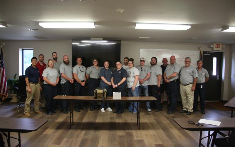 Pictured following the training are (L-R) Dr. Jonathan Poon, Ryan Hollingsworth, Beth Seymour, John Szalay, Jordan Bohannon, Alex Evans, Kayla Bufford, Katie Revard, Amy Mcintosh, Alan McQuaig, Brittany Daniel, Spencer Evans, JD Ellengburg, Mike Mcgarity, Tim Bohannon, Chuck Almond and Mike Webb. (Photo by Scoggins)