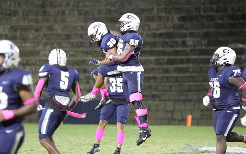Rodriguez and No. 55 D.J. Raiford celebrate following the interception during the Devils’ 34-16 win Oct. 6. (Photo by Wells)