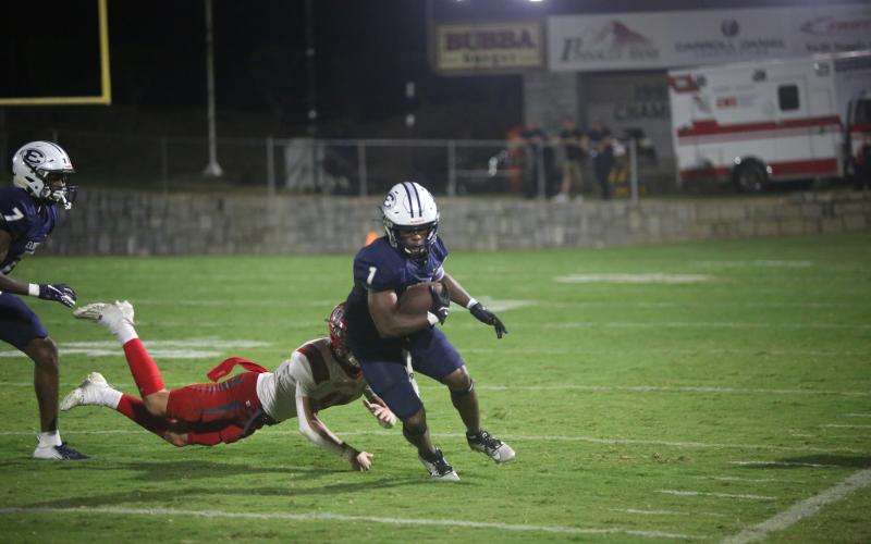 No. 8 Eli Harris, No. 22 Jacari Barnett, No. 1 Ty’Rikis Jones, and No. 55 D.J. Raiford and No. 5 Malik Moon were all named to the Region 8A Division 1 All-Region team. (File photos by Wells)