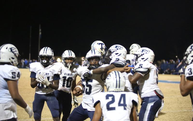 No. 55 D.J. Raiford celebrates with the defense after recovering a fumble during Elbert’s second-round win over Trion Nov. 17. (Photo by Wells)