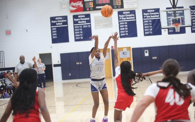 Autumn Davis lets a three-point shot fly during the Lady Rams’ win over Stephens Jan. 4. (Photo by Wells)