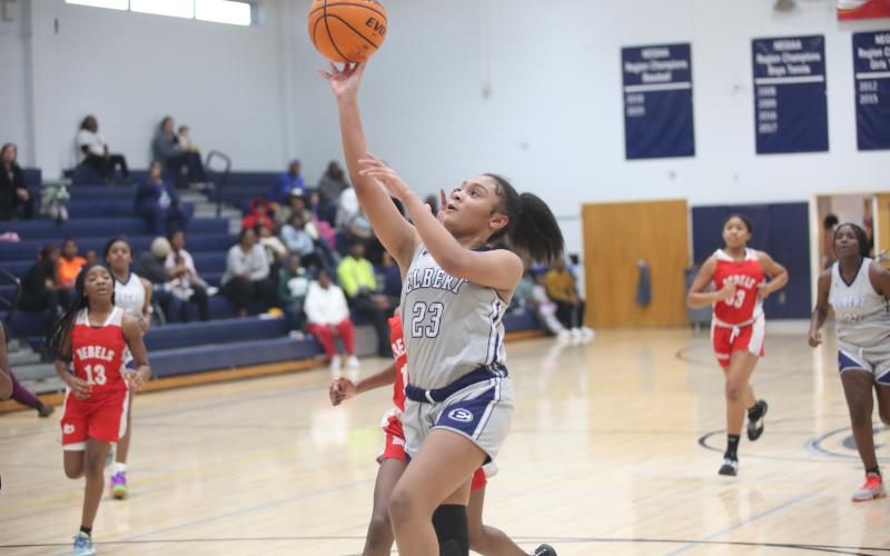 London Billings lays the ball into the basket to cap off a fast break opportunity for the Lady Rams. (Photo by Wells)