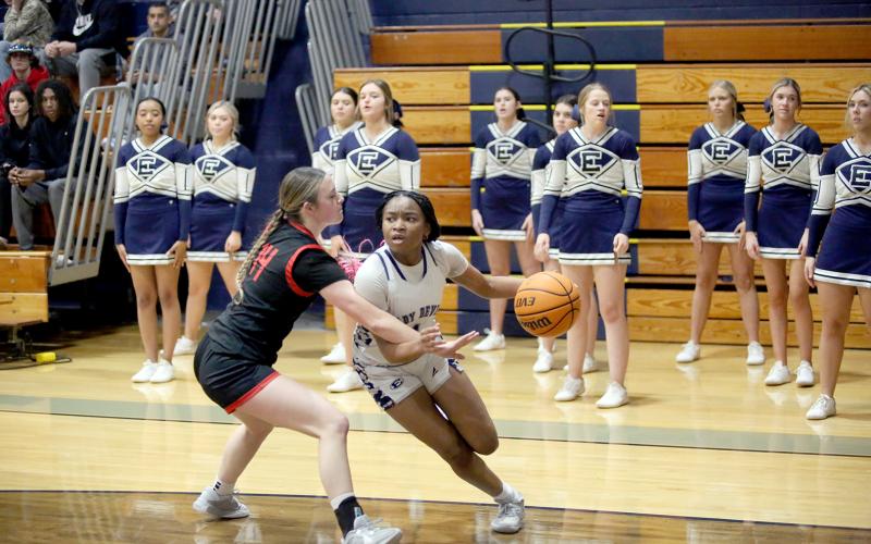 Right, Kaylen Rucker cuts to the basket during Elbert’s loss to Rabun in the Inferno Jan. 19. (Photo by Wells)