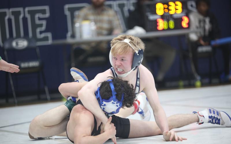 Cooper West works his opponent as he earns a pin in his opening match of the Area 8A Championships held in the Inferno Feb. 2. (Photo by Wells)