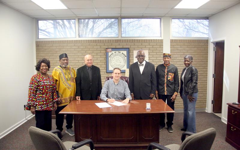 Mayor Daniel Graves signed a proclamation in honor of Black History Month Feb. 8 for the City of  Elberton. Pictured during the signing are (L-R) Carolyn Bolton, Bobby G. Hunt, Elberton City Council member Terry Burton, John Clark, Jimmy White and Pam Allen. (Photo by Wells)