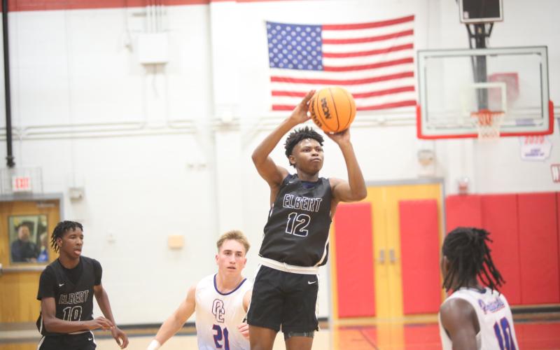 D.K. Winn shoots a three during Elbert’s first-round loss against Oglethorpe. (Photo by Wells)