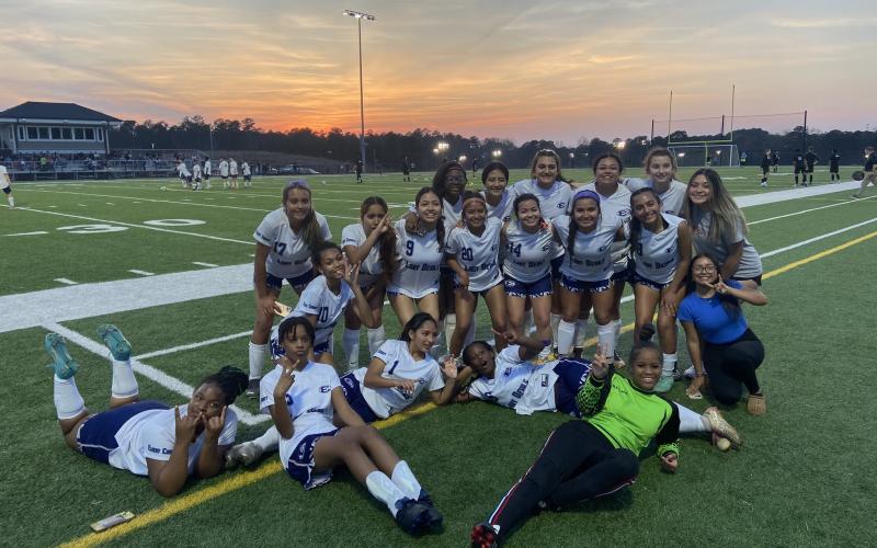 The Elbert County Lady Devils soccer team poses after they beat Barrow Arts and Sciences Academy 2-1 March 15. The Lady Devils are 3-2 in region play and hold onto third place after the big win. (Photo courtesy of the ECCHS Lady Devils Soccer Facebook page)