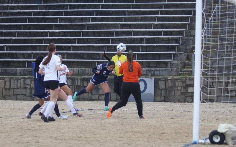Paulina Guerrero heads in a goal during Elbert’s win over Hart. (File photo by Wells)