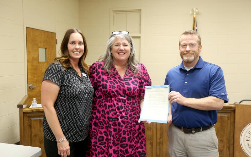 The Elbert County Chamber of Commerce's centennial anniversary was celebrated at all levels over the past week as the City of Elberton, Elbert County Board of Commissioners and State House Rep. Rob Leverett honored the Chamber with resolutions and proclamations. Pictured are (L-R) Chamber Executive Director Rebecca Long, Chamber Chair Susan Fortson and Commission Chairman Lee Vaughn. (Photo by Scoggins)