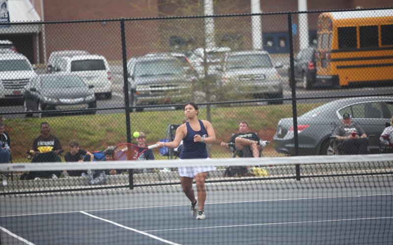 Lady Devils Jude Sanders, Emily Poon and Katie Nguyen led the Lady Devils tennis team to a third-place finish in the Region 8A Division 1 tournament hosted by Elbert at Elbert County Middle School April 8 through April 10. The Lady Devils beat Commerce with a win from Sanders in the last match of the day, which extended Sanders’ winning streak to 14 straight matches. (Photos by Wells)