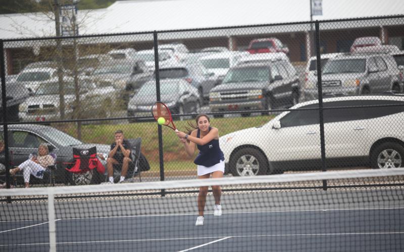 Lady Devils Jude Sanders, Emily Poon and Katie Nguyen led the Lady Devils tennis team to a third-place finish in the Region 8A Division 1 tournament hosted by Elbert at Elbert County Middle School April 8 through April 10. The Lady Devils beat Commerce with a win from Sanders in the last match of the day, which extended Sanders’ winning streak to 14 straight matches. (Photos by Wells)