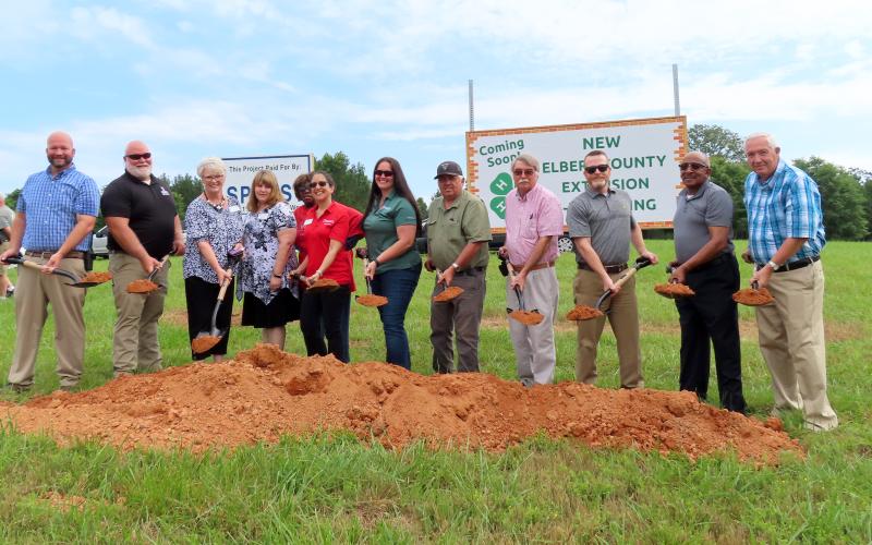 Getting their shovels moving during the ground-breaking cermony on May 24 are County Administrator Allen Hulme, Agriculture/Natural Resources Agent Brian Bradford, Family and Consumer Science Agent Christa Campbell, Administrative Assistant Trisha Willis, Office Assistant Homerzell Heard, Program Assistant Sophie Walsky, 4-H Agent Lauren Dye, Commissioner Chris Alexander, Commissioner Casey Freeman, Commission Chairman Lee Vaughn, Commissioner Freddie Jones and Commissioner David Hunt. (Photo by Weeks)