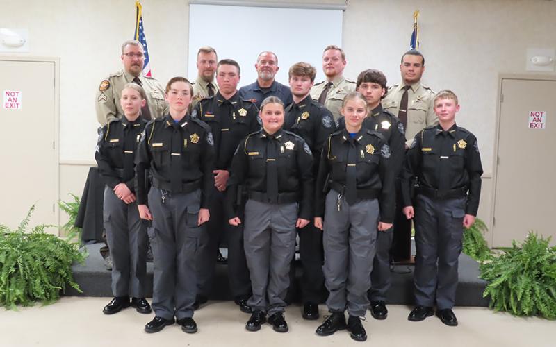 Explorer Academy Post 746 graduates and training officers include (front row L-R) Cad. Brantley Mattox, Cad. Merci Mooney and Cad. Lexi Moon. (Middle row) Cpl. Annabelle Anderson, Sgt. Brody Mattox, Cpt. Edwin Crowe, Cad. Trace Atkins and Cad. Chevy Bailey. (Back row) Cpl. John Rice, Sgt. Noah Hart, Chief Deputy Darren Scarborough, Cpl. Zach Johnson, and Cpl. Jayden Robinson. (Photo by Weeks)