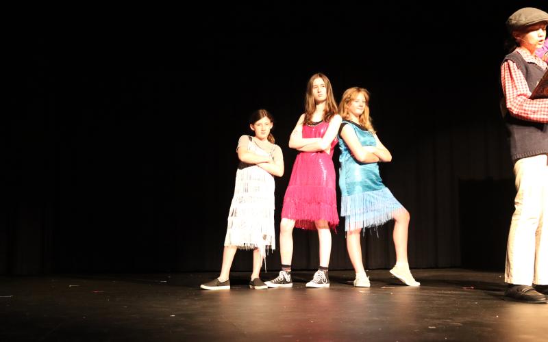 (L-R) Sixth grader Ariana Perez Velasco, sophomore Faith Gailey, and sixth grader Merida Blackston perform "Shake it Up" during the Elbert Theatre's presentation of  "James and the Giant Peach."  The musical, which  is based on the 1961 book of the same name by Roald Dahl, was part of the Elbert Theatre Foundation's summer youth program. (Photo by Weeks)